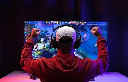 Gaming creator celebrating during a live game session